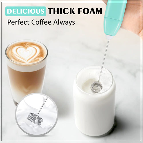 A handheld electric milk frother with a mint green handle is shown creating thick foam in a white container, with a glass of latte featuring heart-shaped foam art and a circular inset showing the whisk attachment. Text at the top reads 'DELICIOUS THICK FOAM' and 'Perfect Coffee Always'.